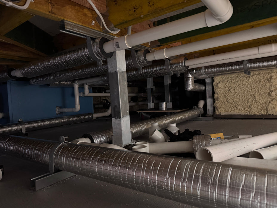 Insulated pipework for cold plunge pools mounted under a deck structure