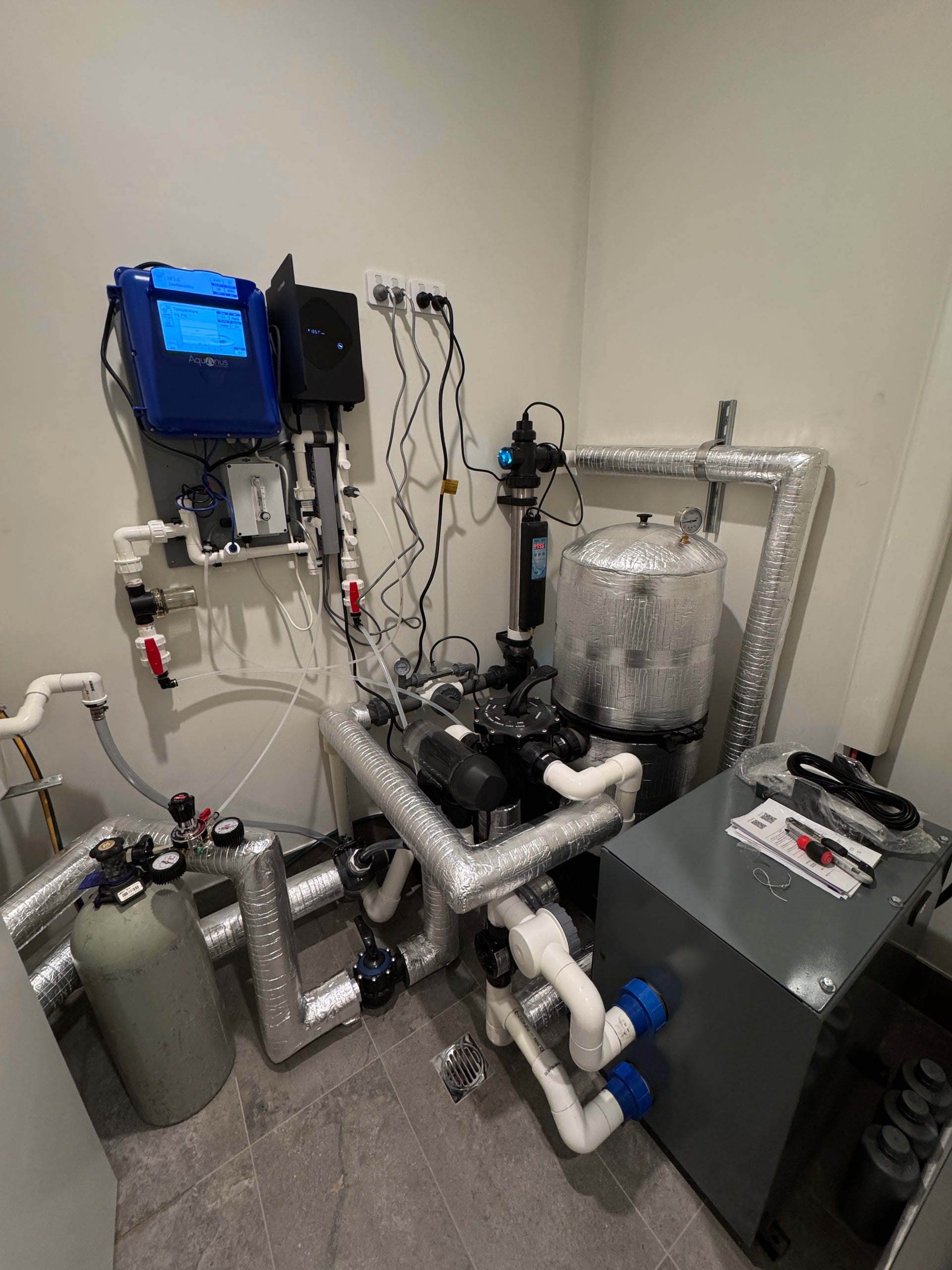Insulated pipework and premium chiller installation for a commercial cold plunge recovery pool.